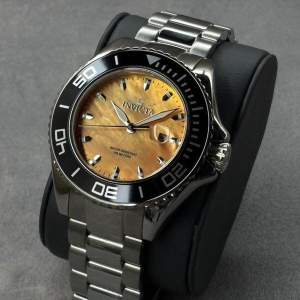 Reloj Invicta Pro Diver Hombre Acero Nácar Naranja - Vista lateral