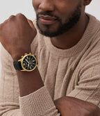 DE Reloj Fossil Flynn Hombre Dorado Piel Negra - Vista trasera