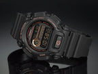 DW-9052GBX Reloj G-Shock Unisex Resina Negro Oro Rosa - Vista lateral
