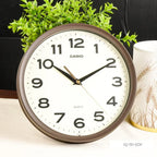 IQ-151 Reloj de Pared Casio Resina Marrón Fondo Crema - Detalle de esfera