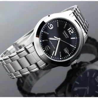 1215A Reloj Casio Hombre Correa de Acero Esfera Negra - Vista lateral