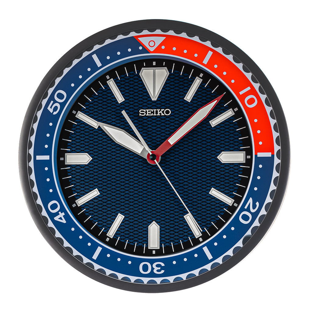 QXA791 Reloj de pared Seiko analógico LumiBrite 30 cm - Azul Rojo