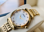 SFQ802P1 Reloj Seiko Essentials Mujer Acero Dorado Esfera Nácar