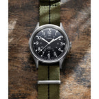 TW2Y71700 Reloj Timex MK1 Hombre Automático Acero Tela Verde