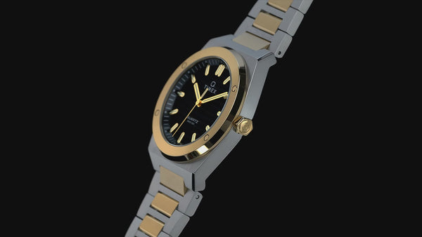 TW2Y81500 Reloj Timex Q Marbella de hombre correa de metal bicolor · video oficial (timex.com)