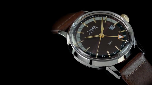 TW2Y84200 Reloj Timex GMT de caballero correa de piel marrón · video oficial (timex.com)